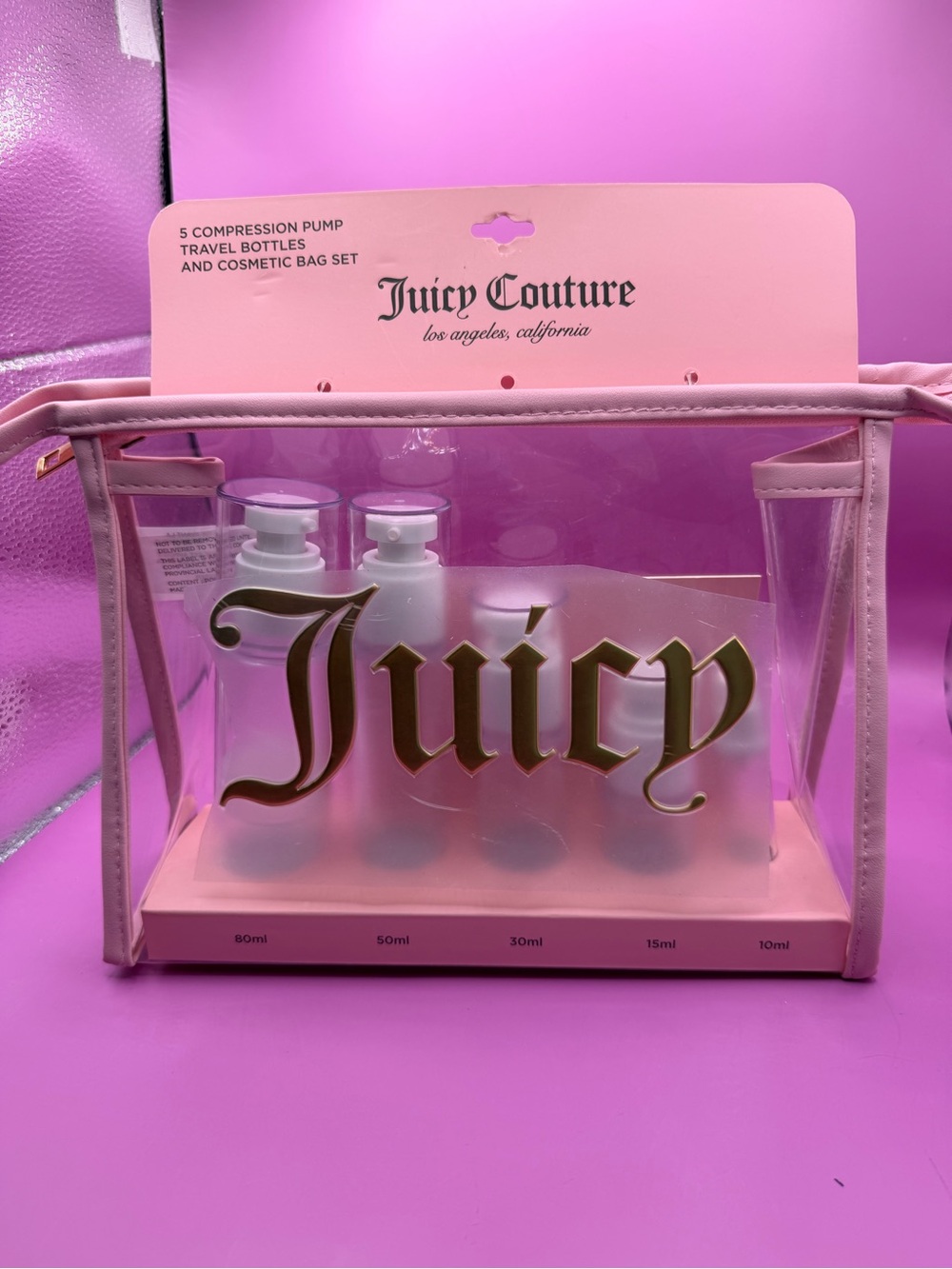 Juicy Couture Cosmetic Bag with 5 Compression Pump Travel Bottles